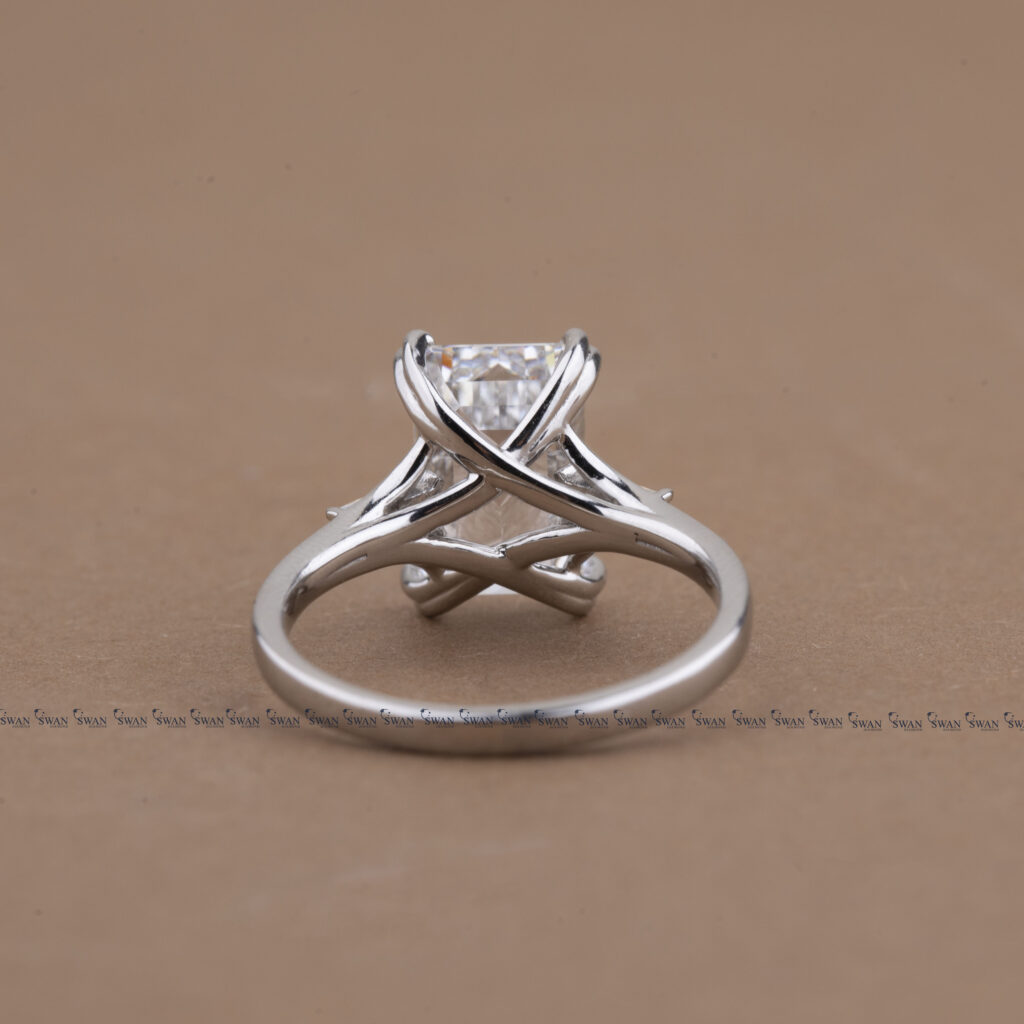 Three Stone Emerald Cut Lab Grown Diamond Engagement Ring With Unique Heart Prong Side Baguette Diamond