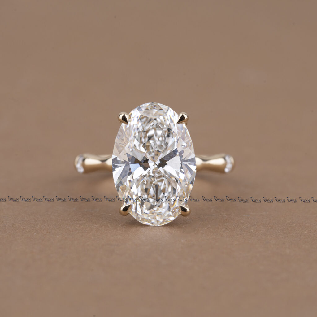Oval Cut IGI Certified Engagement Ring With Unique Bamboo  Inspired Band