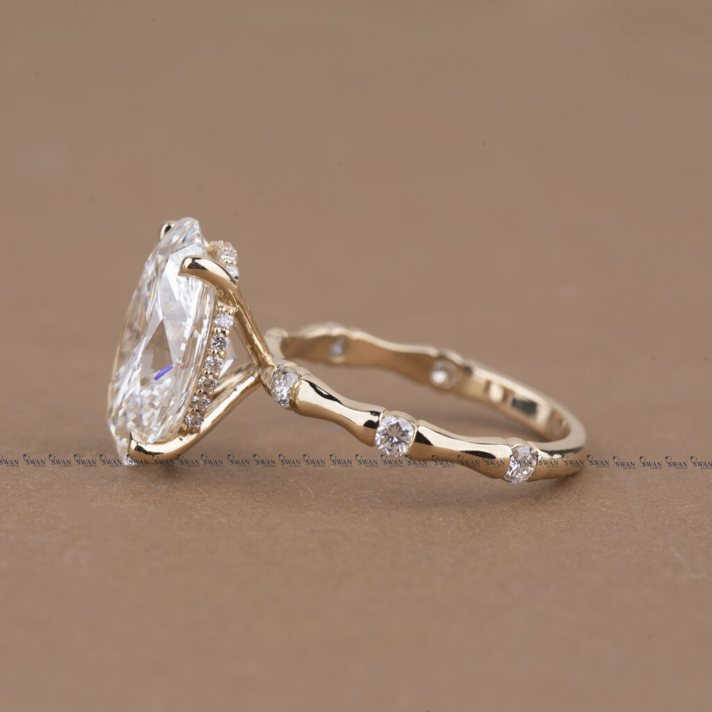 Oval Cut IGI Certified Engagement Ring With Unique Bamboo  Inspired Band