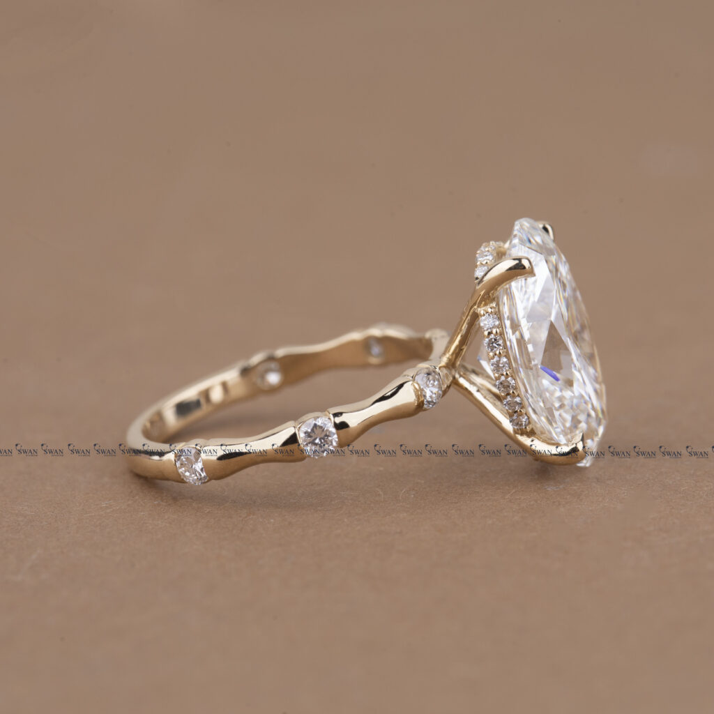 Oval Cut IGI Certified Engagement Ring With Unique Bamboo  Inspired Band