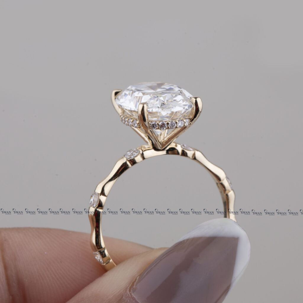 Oval Cut IGI Certified Engagement Ring With Unique Bamboo  Inspired Band