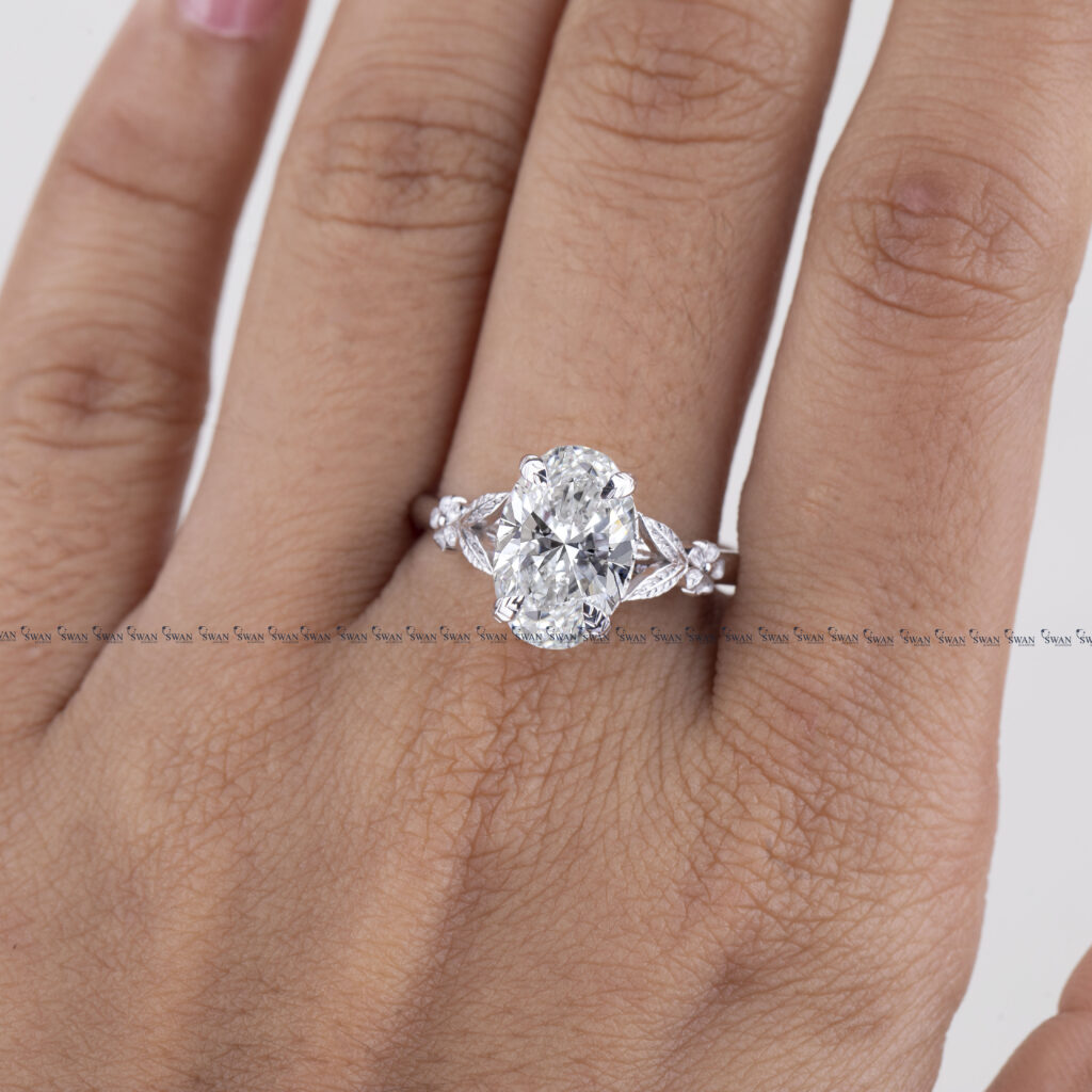 Nature Inspired Oval Lab Grown Diamond Engagement Ring With Side Flower And Leaf Design