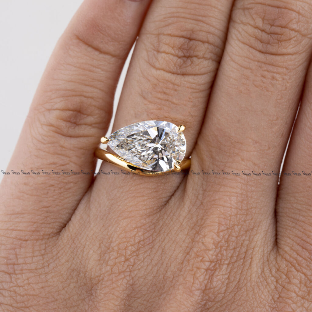 East West IGI Certified Pear Lab Grown Diamond Pink Finger Ring Or Proposal Ring