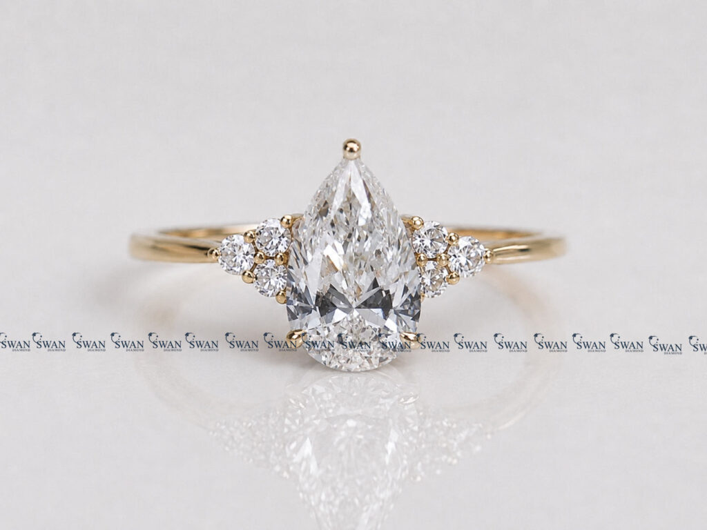 IGI Certified Pear Cut Lab Grown Diamond Engagement Ring Side Cluster Setting