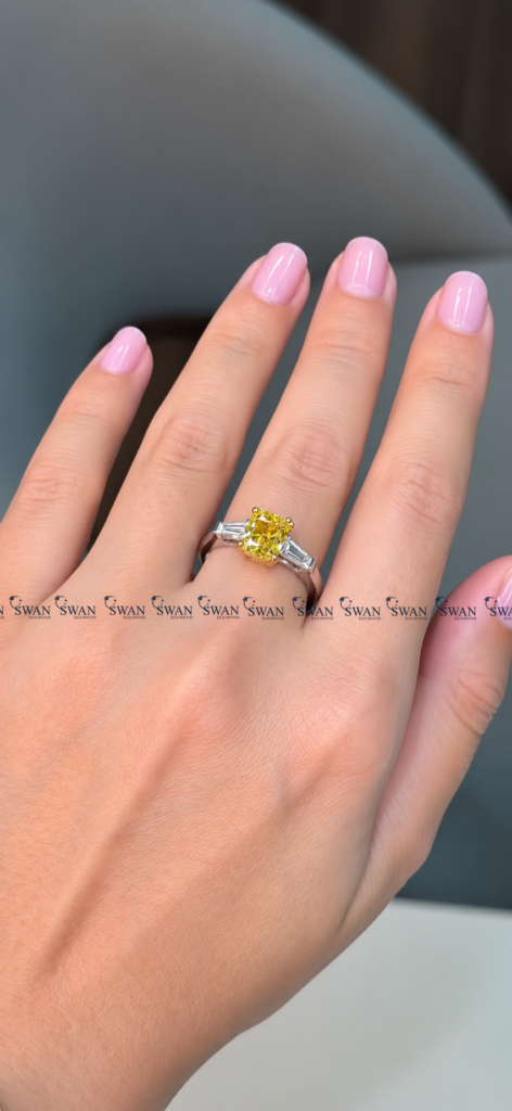 IGI Certified Vivid Yellow Cushion Cut Three Stone Engagement Ring With Side Baguette Stone